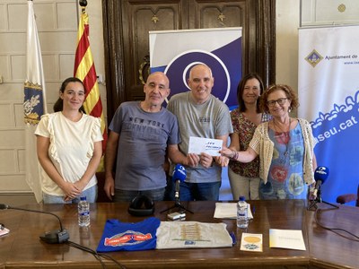 Donació de 'Carretera i Manta', per gentilesa de SIMAC Electrònica, a l'ONG La Seu Solidària