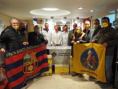 Acte de balanç de la campanya de recollida d'ulleres de 'Cruzada por la Alegría', a l'establiment d'Òptica Isern